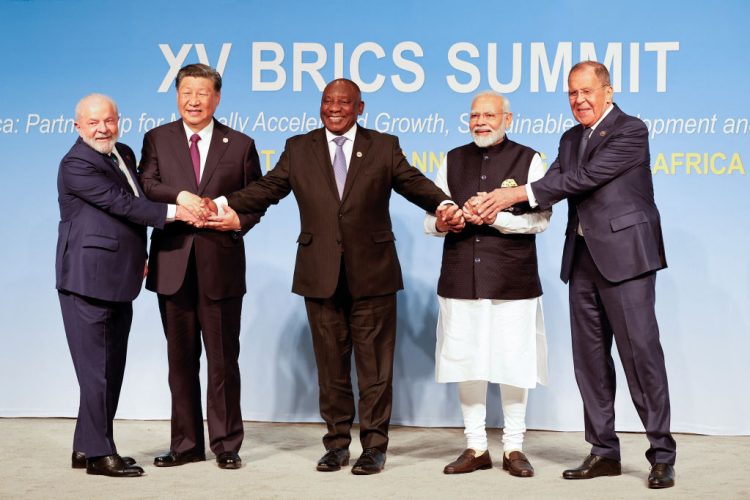 TOPSHOT - (From L to R) President of Brazil Luiz Inacio Lula da Silva, President of China Xi Jinping, South African President Cyril Ramaphosa, Prime Minister of India Narendra Modi and Russia's Foreign Minister Sergei Lavrov pose for a BRICS family photo during the 2023 BRICS Summit at the Sandton Convention Centre in Johannesburg on August 23, 2023. (Photo by GIANLUIGI GUERCIA / POOL / AFP) (Photo by GIANLUIGI GUERCIA/POOL/AFP via Getty Images)